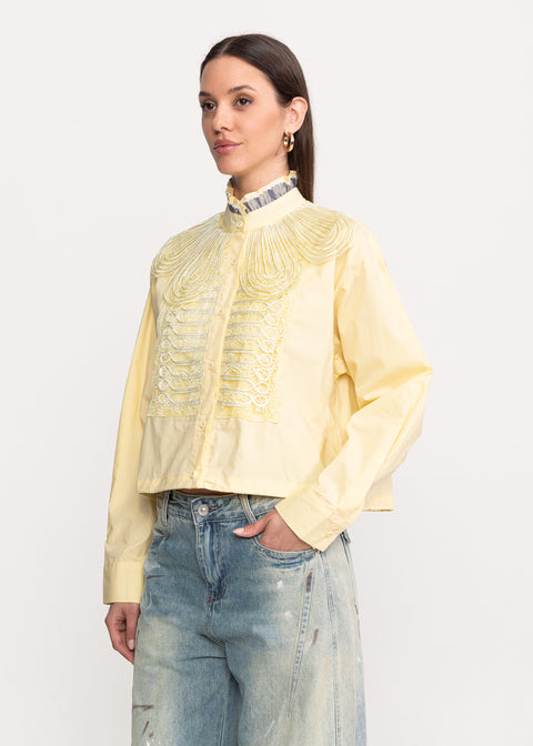 Short shirt with decorative embroidery