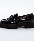 Pantofi loafer negri din piele lăcuită, cu talpă tip platformă și ciucuri