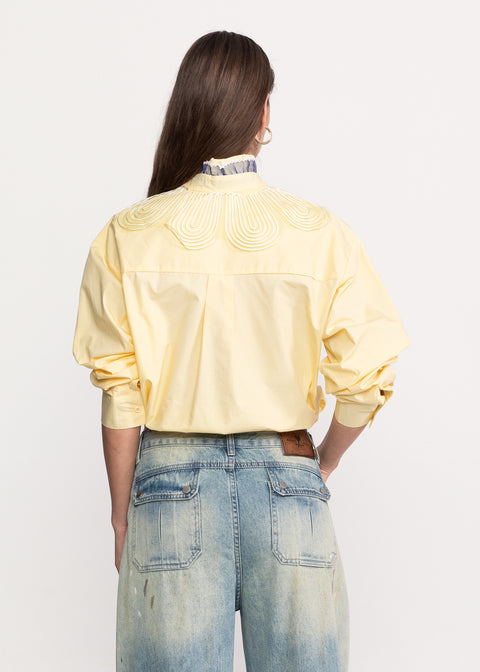 Short shirt with decorative embroidery
