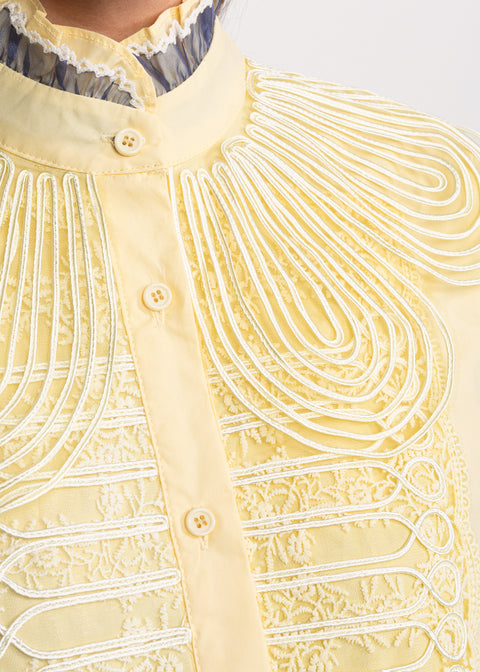 Short shirt with decorative embroidery