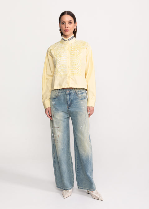 Short shirt with decorative embroidery